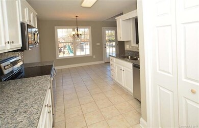 Kitchen & Adjoining Breakfast Area