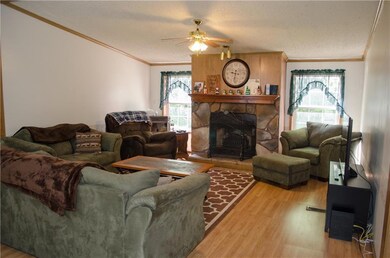 Large living room with fireplace and...