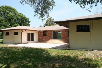 rear of home and paver patio