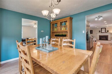 The nicely sized dining room is the perfect centra