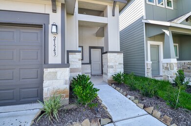 This home features a covered porch as well.