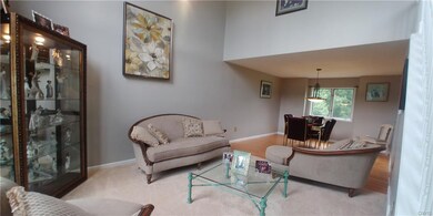 Living room opens to lovely dining room.
