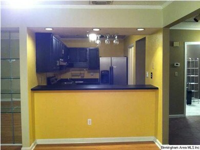 Bar opens from dining room to kitchen.
