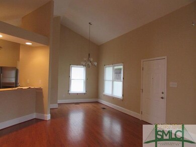 Dining room has new lighting and new engineered ha