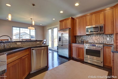Gourmet cherry Shaker kitchen