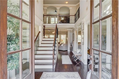 Entrance foyer with ornamental molding, a ceiling 