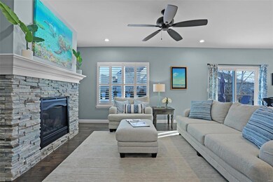 Living room has an abundance of natural light.