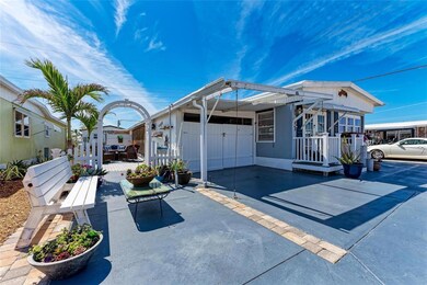 Enclosed carport with additional parking