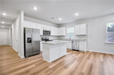 Stainless steel appliances with plenty of countert
