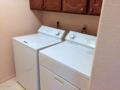 INSIDE LAUNDRY W/ WASHER/DRYER