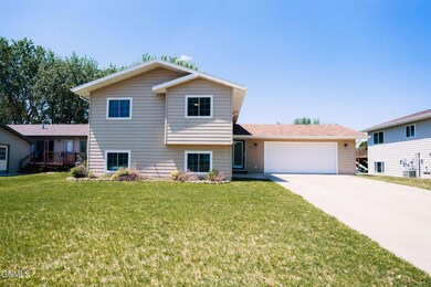 1519 8th Ave NE, Jamestown, ND 58401 - photo 2