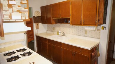 Kitchen appliances and washer and dryer stay with home. 