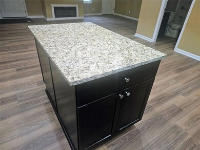Details with baseboards and wood finished floors