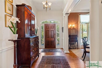 Large entry Foyer with wood floors and beautiful m