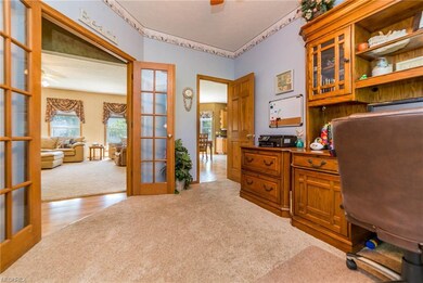 Beautiful first floor office has glass French door