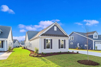 View of front of house with a front yard