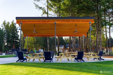 Generous outdoor gathering spaces encourage residents to meet, play and relax! This pavilion features gas BBQ taps, electrical outlets and lighting.