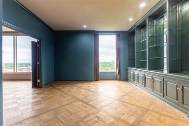 Versatile space with ample built-in shelves.