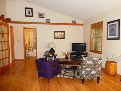 Living Room. Gorgeous hard wood floors and vaulted