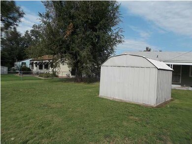 Shed in big back yard.