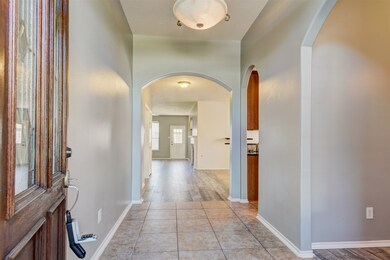 Beautiful Entryway opens to formal dining