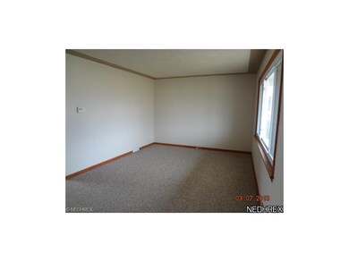 Living room with large front window