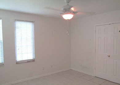 Second bedroom with double-door closet.