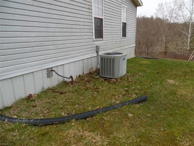 Side view of Exterior with newer Air Conditioning 