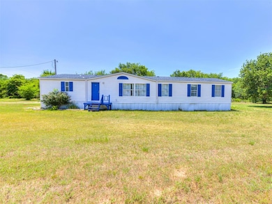 View of front of property featuring a front yard