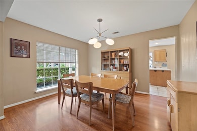 The formal dining room offers a stylish nod to mid