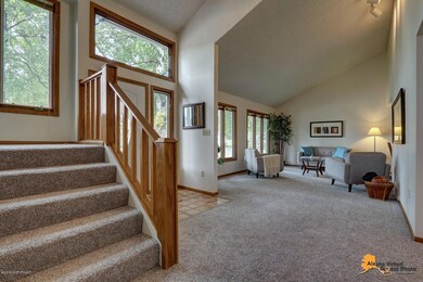 Front Entrance & Stairs to 2nd Level