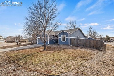 Ranch-style house featuring a garage