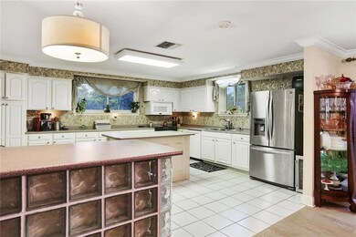 Huge kitchen area with plenty of cabinetry for sto
