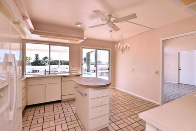Kitchen island and eat-in area.