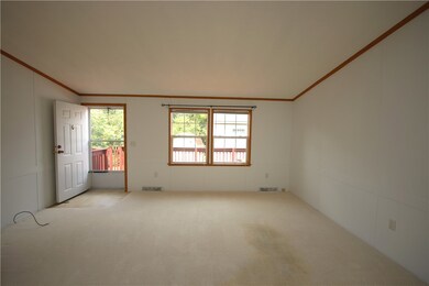 Another View of Living Room w/ Door to Deck