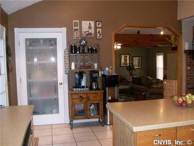 Kitchen View of Pantry and step down 23 x 23 livin