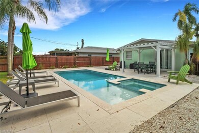 View of swimming pool with a patio, a pergola, and
