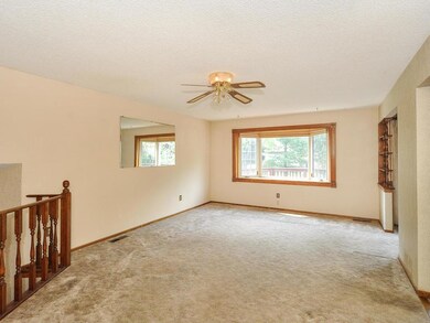 Spacious living room with large bay window