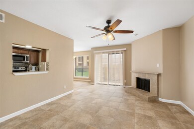 This inviting living space features a tiled floor,