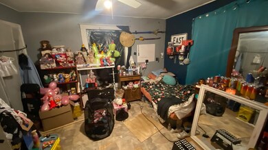 Miscellaneous room featuring a ceiling fan