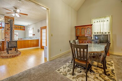 The Dining Room is open to the Kitchen and has a v