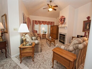 Spacious Living Room (19x13) Features a Gas Burnin