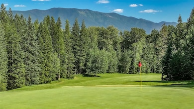 Greens, Fairways and Mountains -- the perfect location for a beautiful home!