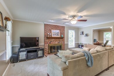 Living Room with brick fireplace