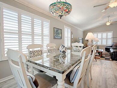 DINING ROOM ... PLANTATION SHUTTERS! Light fixture over the table does not convey!