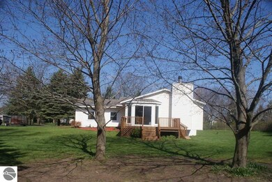 View of the side yard and deck.