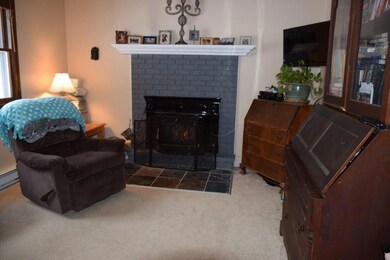 Living Room with Fireplace (wood...