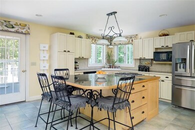 Large eat in kitchen with tile and...