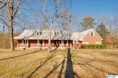 This home features lake side living. The home has 4 bedrooms. One of the bedrooms adjoins an additional living-kitchenette space with bath that could be a separate living space or the space could be converted to a rec room.