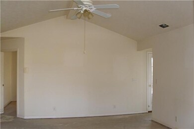 View from Entry - Vaulted Ceiling in Living Room!